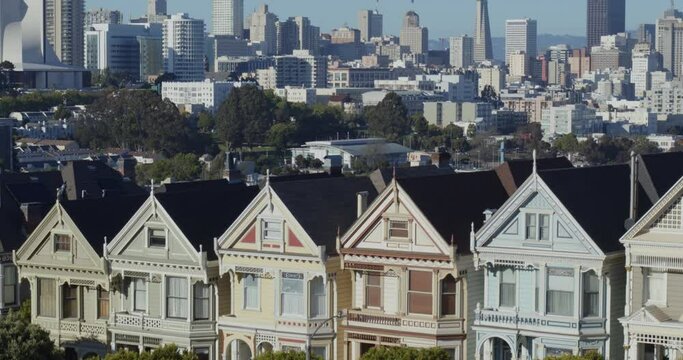 Pan Up From Painted Ladies to an Aerial View of Downtown San Francisco