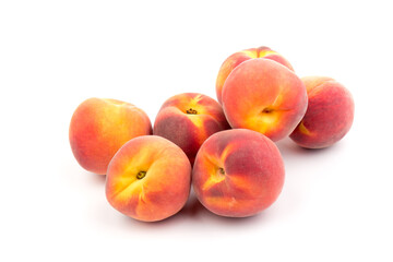 Summer fruit background. Ripe juicy peaches on white background. Copy space. Fresh organic fruit vegan food. Harvest concept