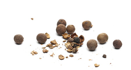 Allspice, pimento spice crushed,  Jamaican pepper and shavings isolated on white background