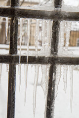 Icicles on a gate in close up