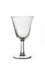 Empty wine glass with brushed ornaments, isolated on white background.