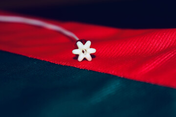 white object on red surface