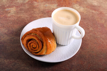 Cinnamon buns and cup of coffee