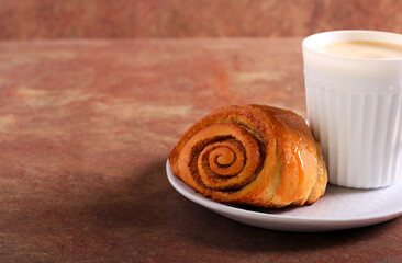 Cinnamon buns and cup of coffee