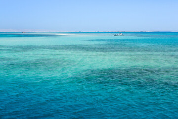 Fototapeta na wymiar View of the Clean and Clear Red Sea in Egypt. Background of blue water.