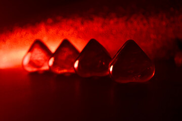 heart shape marbles in a row