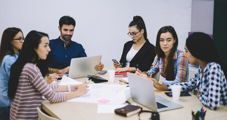 Group of colleagues working together in office