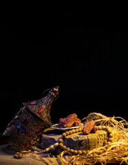 Ramadan concept with dried dates and lantern
