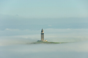 hercules tower lighthouse on the fog