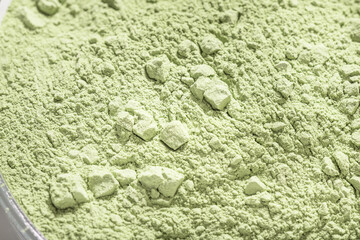 Green dry clay povder, textured background