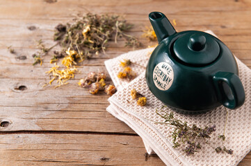 Homemade Herbal Soothing Immune Booster Tea, Chamomile & Calendula in Green Ceramic Teapot