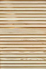 Stylish light wooden blinds made of thin plain planks and boards in contemporary carpentry workshop as background close view