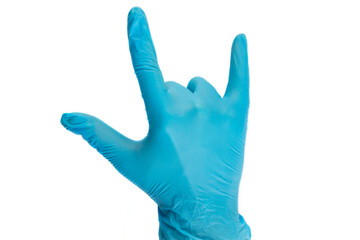 Doctor's hand showed horns gesture (symbol of heavy metal) in blue medical (surgical) gloves on white background.