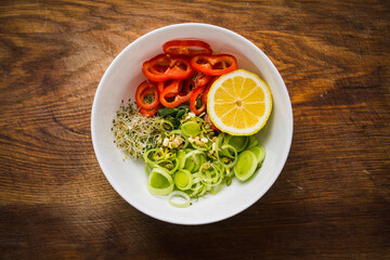 Vegan, detox green Buddha bowl recipe. organic raw fresh various microgreens for healthy salad, sprouted green cereals for healthy food concept. Food and health. Superfood food. Top view, flat lay.