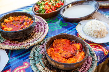 Arabic Cuisine. Traditional Egyptian food. Egyptian oriental dinner meat with red sauce and salad. African food.