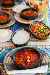 Arabic Cuisine. Traditional Egyptian food. Egyptian oriental dinner meat with red sauce and salad. African food.