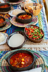 Arabic Cuisine. Traditional Egyptian food. Egyptian oriental dinner meat with red sauce and salad. African food.