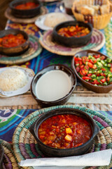 Arabic Cuisine. Traditional Egyptian food. Egyptian oriental dinner meat with red sauce and salad. African food.