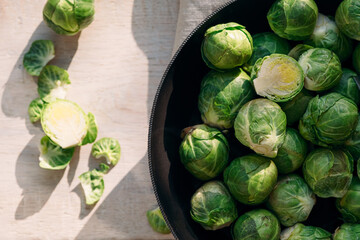 brussel sprouts in metal bowl on table