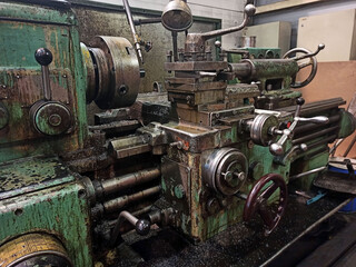 Vintage lathe in the workshop at the factory.