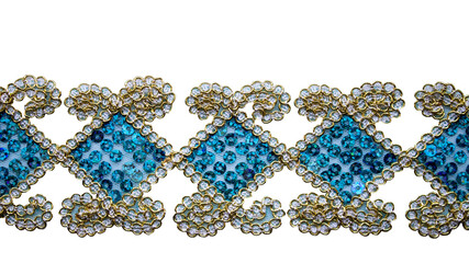 The braid, trimmed with notes of gold, is decorated with blue rhinestones. Isolated on white background.
