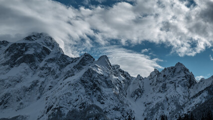 Fototapeta premium Frozen lake of fusine in a sunny afternoon, Friuli-Venezia Giulia, Italy