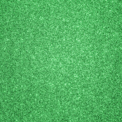 Green glitter texture background for Christmas and Saint Patrick’s day holiday decoration metallic wallpaper backdrop design