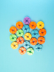 Plastic building blocks isolated on blue background. Top view with copy space