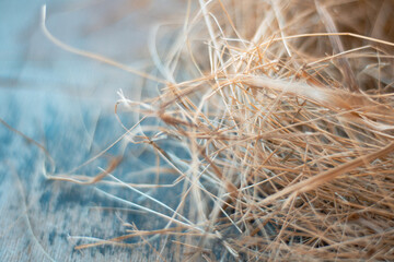 Hay texture. Hay bales are stacked in large stacks. Harvesting in agriculture.