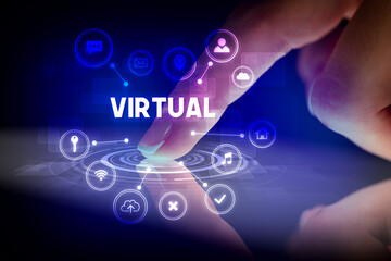 Finger touching tablet with web technology icons and VIRTUAL inscription, web technology concept