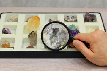 viewing a collection of minerals through a lens
