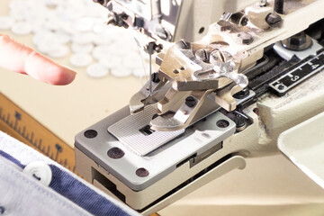 A Sewing production, loops buttons, knitwear clothing