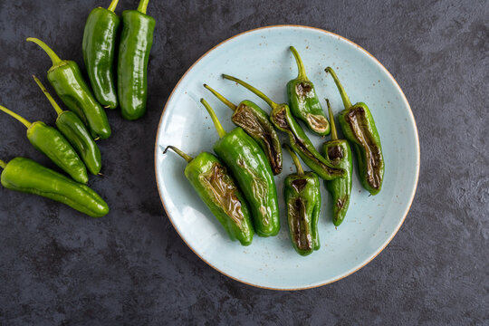 Green fresh chili peppers padron grilled or fried in the Spanish style