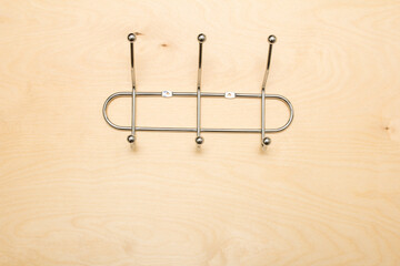 Fototapeta premium wall hanger on wooden background