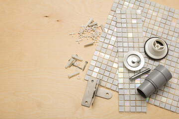 Plumbing tools and tiles. Home improvement background
