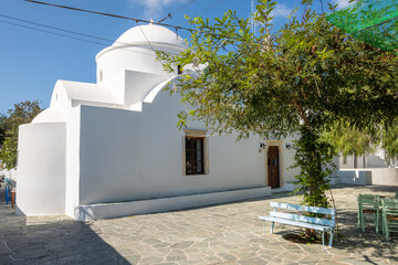 Traditional Greek whitewashed church in charming Chora, the capital of the island of Folegandros.