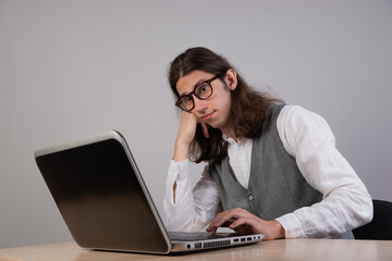 geek guy is trying to write code or learn a new programming language, experience difficulties in...