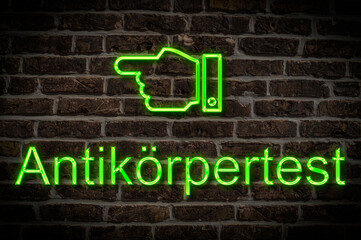 Fototapeta premium Leuchtreklame Antikörpertest
