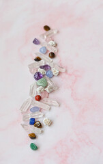colorful minerals on abstract marble background. healing reiki chakra gemstones. Crystal Ritual,...