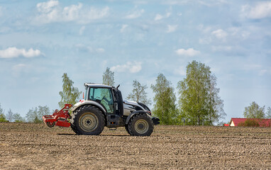 Agricultural work in the field in spring.