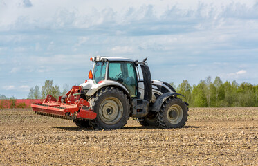 Agricultural work in the field in spring.