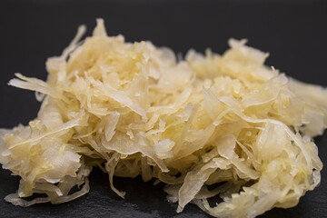 homemade raw sauerkraut on a slate plate