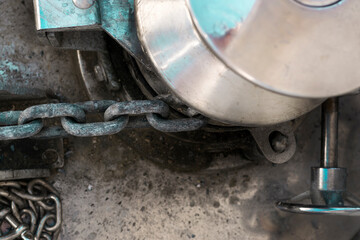 Vessel chain close up on windlass anchor winch capstan