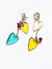 beautiful earrings in the form of hearts with crystal