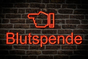 Fototapeta premium Leuchtreklame Blutspende