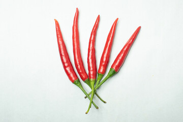 red chili on a white background