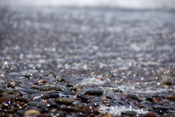 Stones among the waves on the seashore