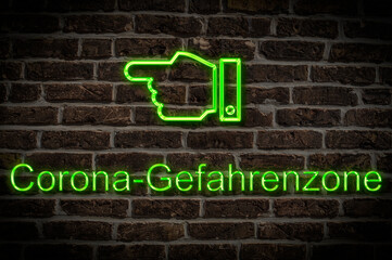 Fototapeta premium Leuchtreklame Corona-Gefahrenzone