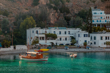Fototapeta na wymiar The whitewashed waterfront at Loutra, Southern Coast of Crete.