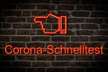 Fototapeta premium Leuchtreklame Corona Schnelltest